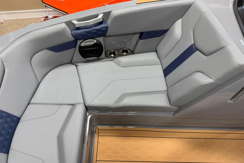 Slide: The Image of Luxurious seating in 2026 MasterCraft XT22 boat with sleek gray and blue upholstery. - 15