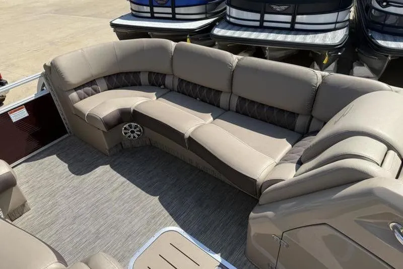 Slide: The Image of Luxurious seating on 2020 Bennington 25 QSBIO pontoon boat, featuring plush beige upholstery. - 18