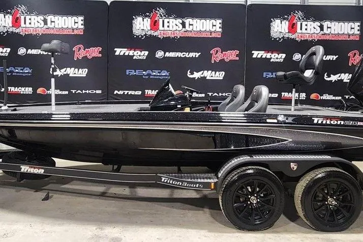 The Image of 2026 Triton 20XP Patriot boat on display at Anglers Choice event. - 1