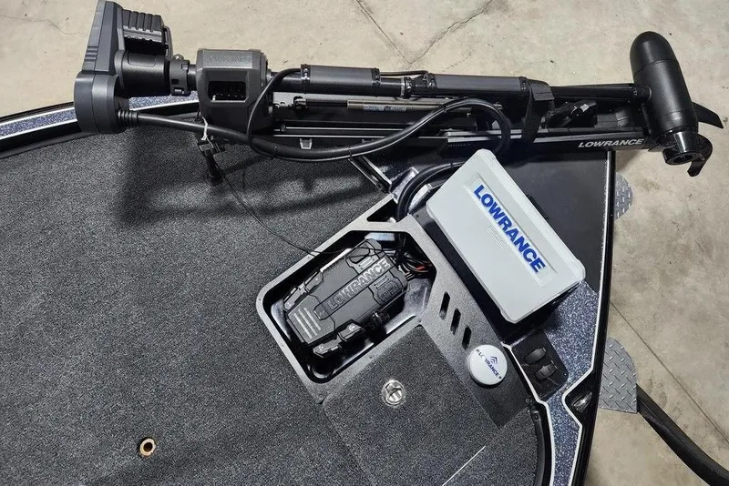 Slide: The Image of Triton 20XP Patriot 2026 boat deck with Lowrance equipment and trolling motor. - 6