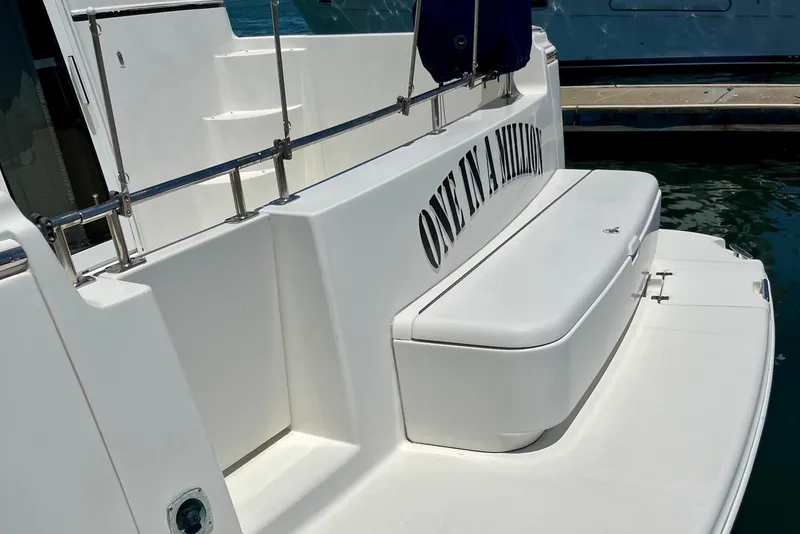 Slide: The Image of 2004 Carver 444 Cockpit Motor Yacht with "One in a Million" text on the stern. - 22
