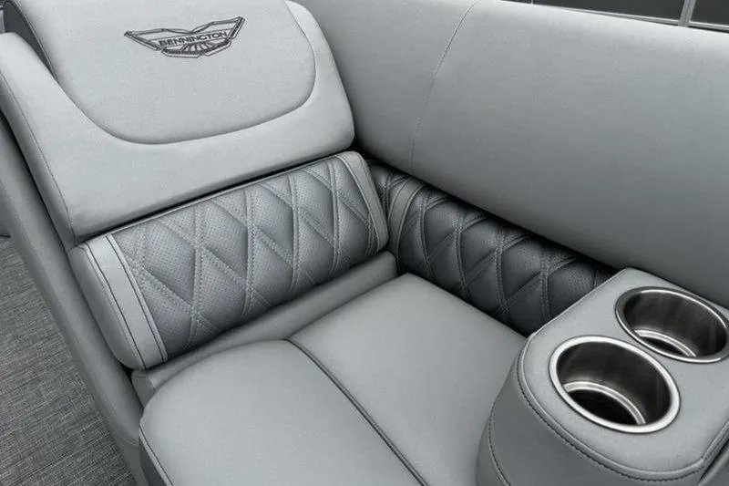Slide: The Image of Luxurious seating with cup holders in 2025 Bennington 26 LXSSB boat interior. - 7