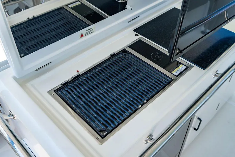 Slide: The Image of Outdoor grill on 2024 Aquila 44 Yacht, featuring sleek design and modern amenities. - 101