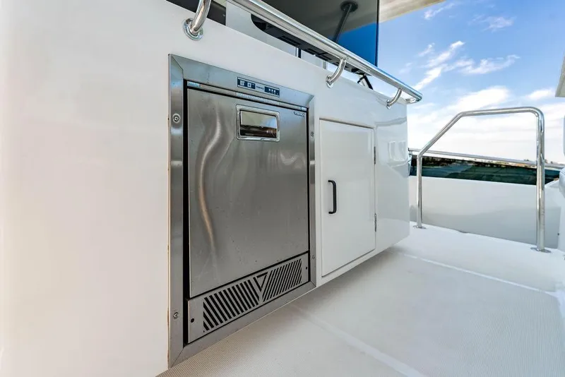 Slide: The Image of Stainless steel appliance on 2024 Aquila 44 Yacht deck, with ocean view. - 102