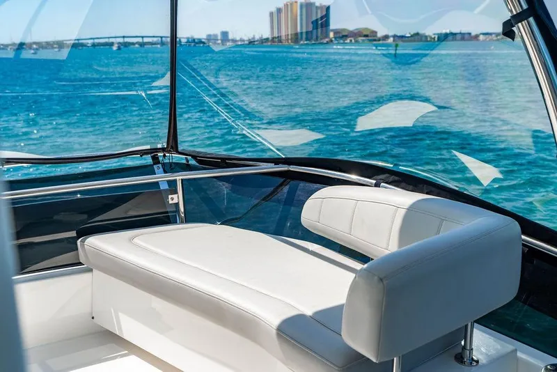 Slide: The Image of 2024 Aquila 44 Yacht interior with luxurious seating and ocean view. - 104