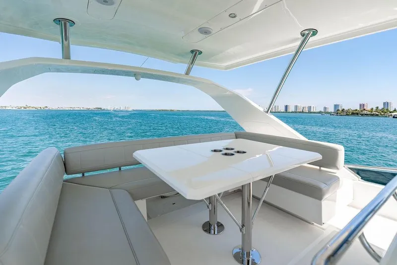 Slide: The Image of Luxurious seating area on 2024 Aquila 44 Yacht with ocean view. - 105