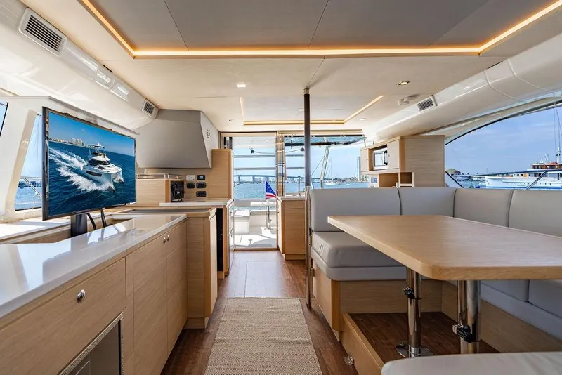 Slide: The Image of Luxurious interior of 2024 Aquila 44 Yacht with modern furnishings and scenic views. - 61