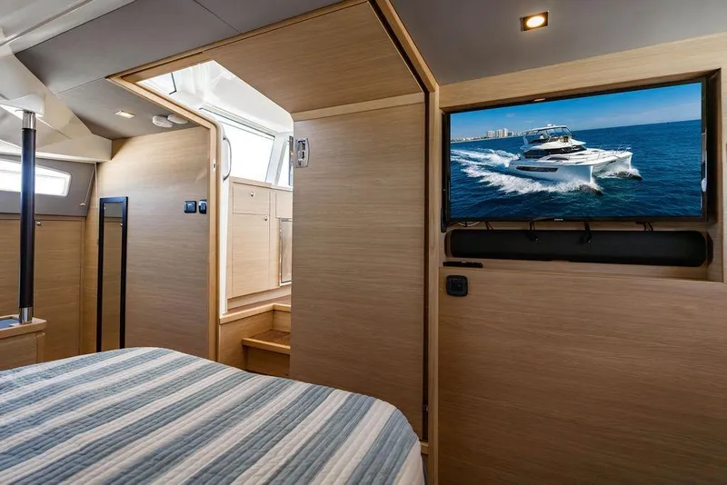 Slide: The Image of Luxurious interior of 2024 Aquila 44 Yacht with TV and modern design. - 67