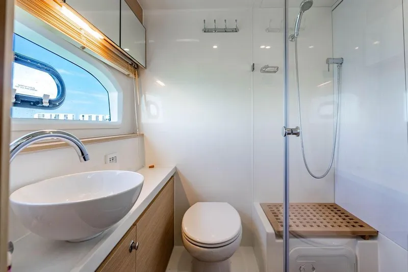 Slide: The Image of Luxurious bathroom on 2024 Aquila 44 Yacht with modern fixtures and shower. - 77