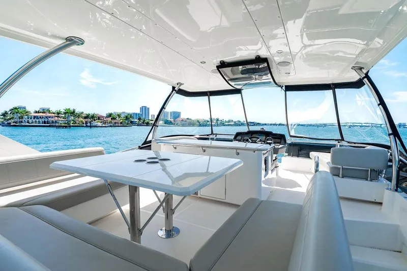 Slide: The Image of Luxurious interior of 2024 Aquila 44 Yacht with ocean view and modern seating. - 91