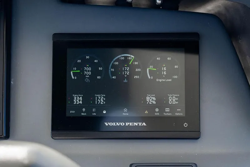 Slide: The Image of Volvo Penta engine display on 2024 Aquila 44 Yacht dashboard, showing RPM and engine load. - 95