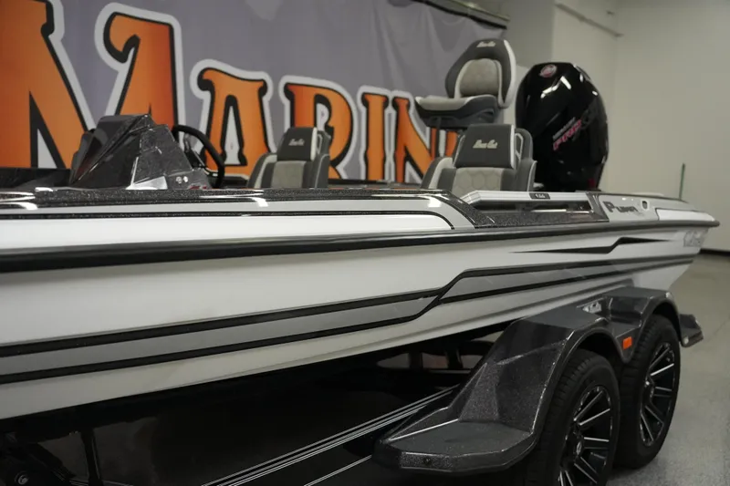 Slide: The Image of 2026 Bass Cat Puma STS boat with sleek design and modern features. - 12