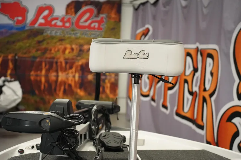 Slide: The Image of 2026 Bass Cat Puma STS boat seat with logo, showcased at an event. - 14