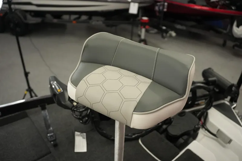 Slide: The Image of 2026 Bass Cat Puma STS boat seat with hexagonal pattern and gray upholstery. - 15