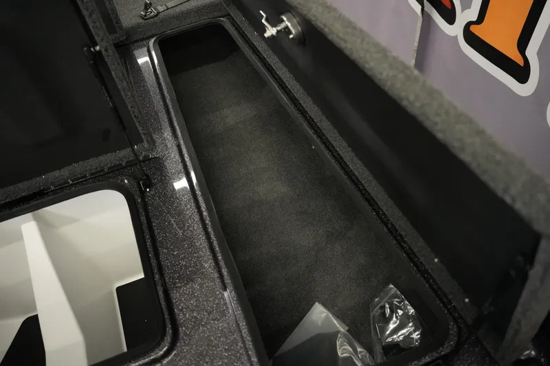 Slide: The Image of Storage compartment of 2026 Bass Cat Puma STS boat, featuring spacious interior design. - 23