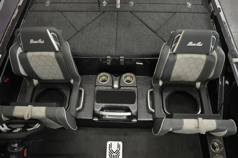 Slide: The Image of 2026 Bass Cat Puma STS interior with dual seats and center console. - 35