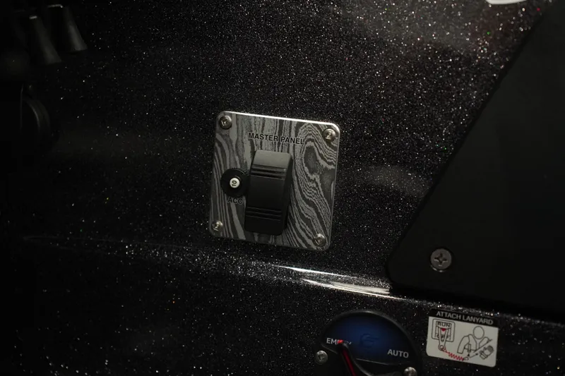 Slide: The Image of Master panel switch on 2026 Bass Cat Puma STS boat dashboard. - 37