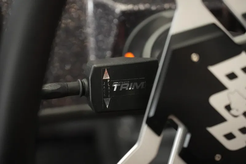 Slide: The Image of Close-up of 2026 Bass Cat Puma STS Pro Trim control switch. - 40