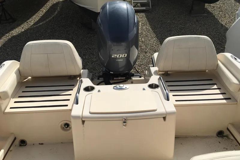 Slide: The Image of 2021 Grady-White Freedom 215 boat with Yamaha 200 engine, rear seating view. - 3