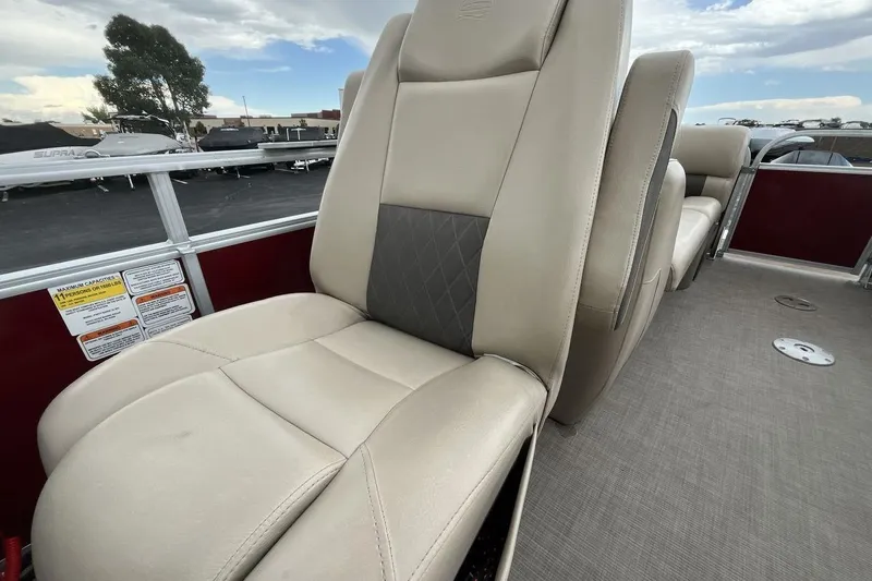 Slide: The Image of 2021 Sun Tracker Party Barge 22 XP3 interior seating with beige upholstery. - 13