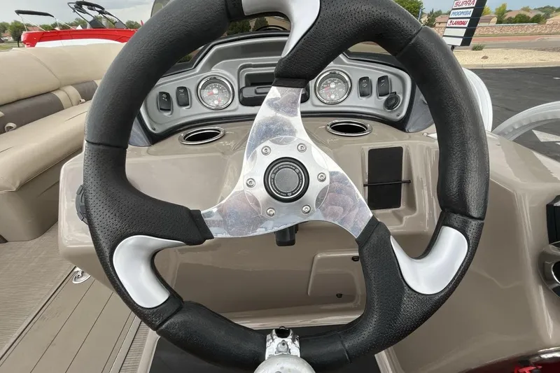 Slide: The Image of Steering wheel of 2021 Sun Tracker Party Barge 22 XP3 pontoon boat. - 14