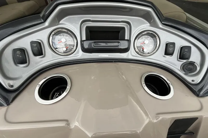 Slide: The Image of Dashboard of 2021 Sun Tracker Party Barge 22 XP3 with gauges and controls. - 15