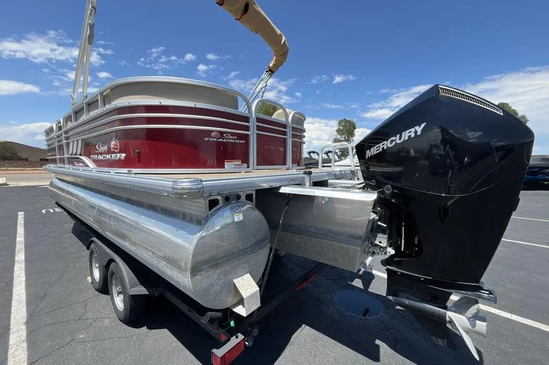 Slide: The Image of 2021 Sun Tracker Party Barge 22 XP3 pontoon boat with Mercury engine on trailer. - 3