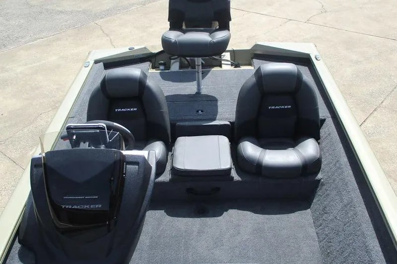 Slide: The Image of 2026 Tracker Pro Team 175 boat interior with seating and steering console. - 12