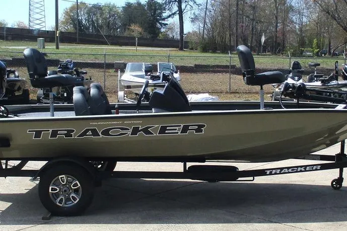 Slide: The Image of 2026 Tracker Pro Team 175 boat on trailer, parked outdoors. - 6