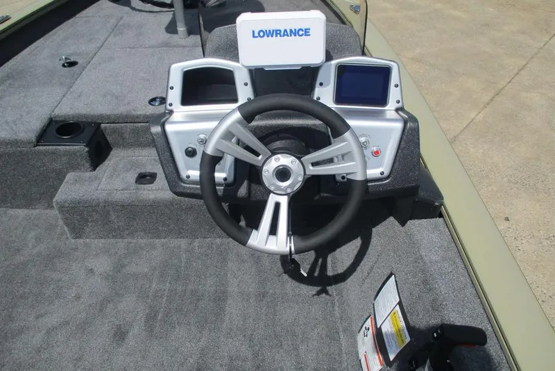Slide: The Image of Steering console of 2026 Tracker Pro Team 175 boat with Lowrance electronics. - 7