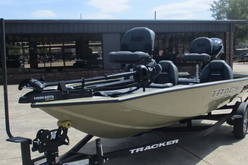 Slide: The Image of 2026 Tracker Pro Team 175 boat with Minn Kota motor on trailer. - 9