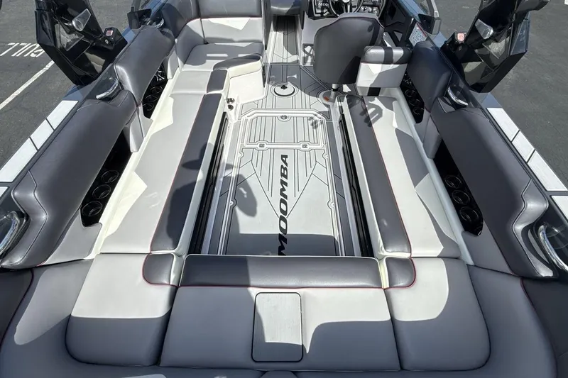 Slide: The Image of 2022 Moomba Makai boat interior with spacious seating and modern design. - 10