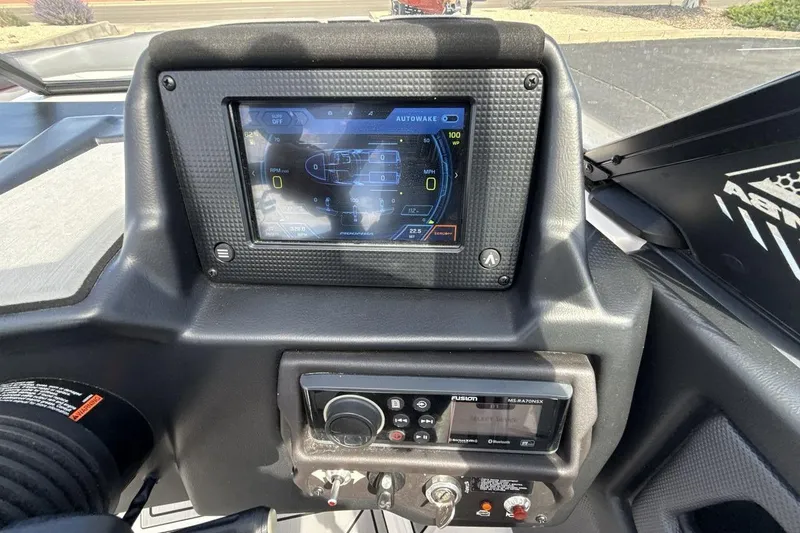 Slide: The Image of 2022 Moomba Makai dashboard with touchscreen display and control panel. - 15