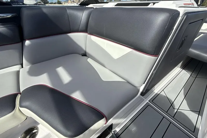 Slide: The Image of 2022 Moomba Makai boat interior with sleek, modern seating and stylish upholstery design. - 17