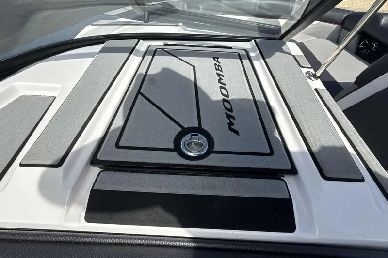 Slide: The Image of 2022 Moomba Makai boat deck with logo and sleek design. - 18