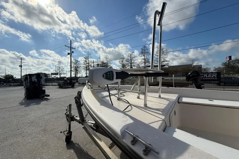 Slide: The Image of 2002 Pathfinder 1900 V boat on trailer under a bright blue sky. - 10