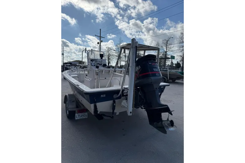 Slide: The Image of 2002 Pathfinder 1900 V boat with Yamaha 150 outboard motor on trailer. - 5