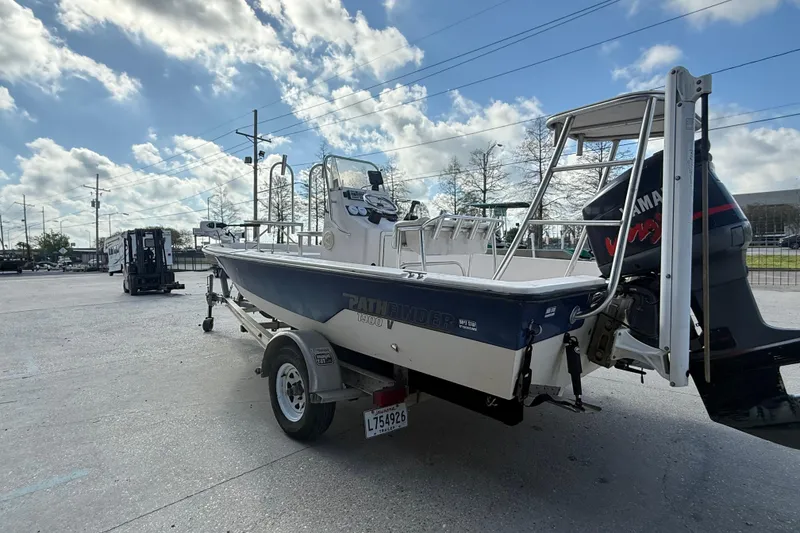 Slide: The Image of 2002 Pathfinder 1900 V boat on trailer with Yamaha outboard motor. - 6