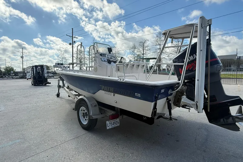 Slide: The Image of 2002 Pathfinder 1900 V boat on trailer with Yamaha outboard motor. - 7