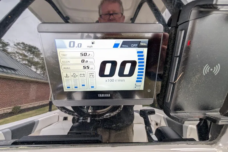 Slide: The Image of Yamaha display on 2023 Robalo R230 Center Console showing trip and fuel data. - 19