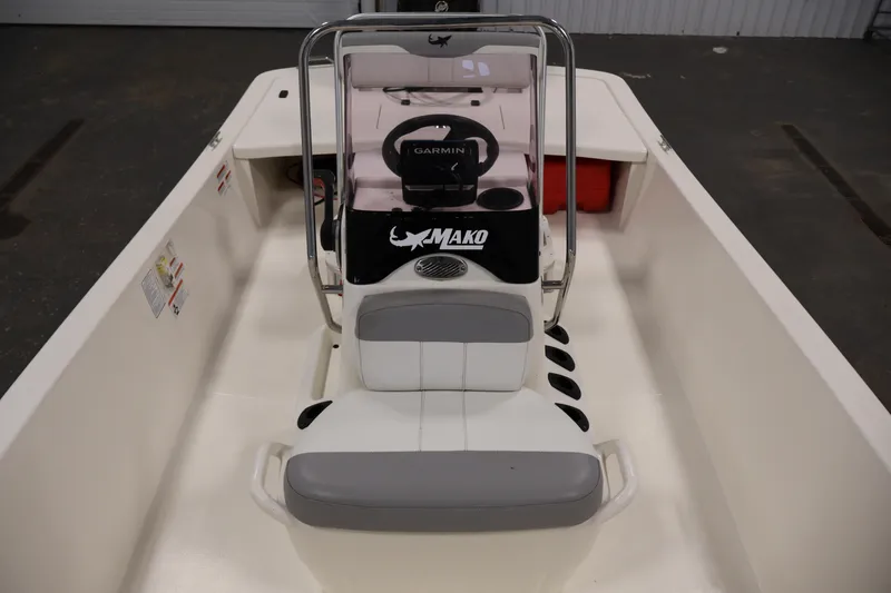 Slide: The Image of 2022 Mako Pro Skiff 17 CC boat interior with Garmin navigation system. - 13