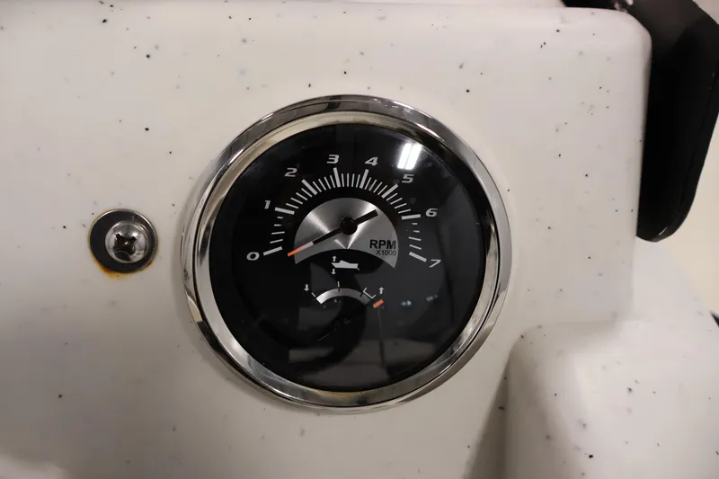 Slide: The Image of Close-up of RPM gauge on 2022 Mako Pro Skiff 17 CC boat dashboard. - 20