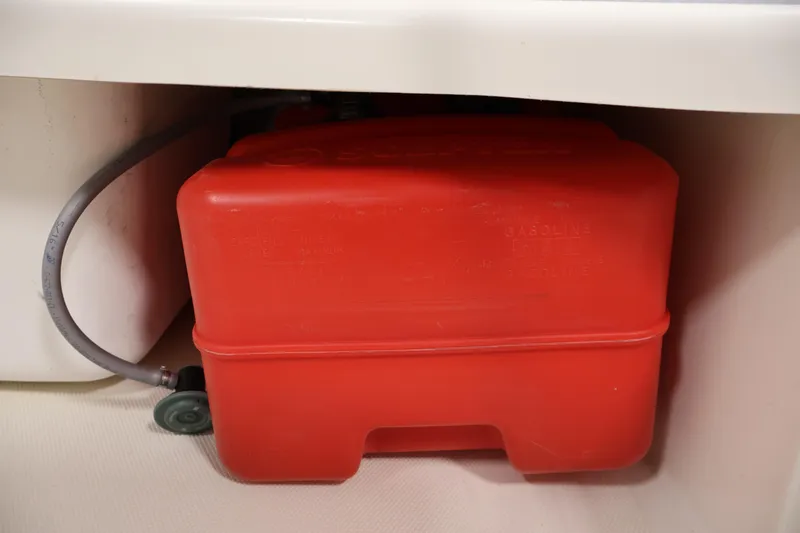 Slide: The Image of Red fuel tank in a 2022 Mako Pro Skiff 17 CC boat. - 28