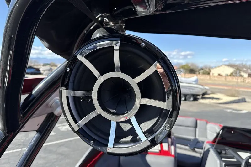 Slide: The Image of Close-up of a 2022 Moomba Mojo boat speaker with a sleek metallic grille. - 21