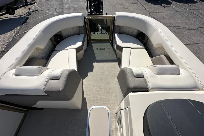 Slide: The Image of Interior of 2026 Alera M23Q boat with plush seating and modern design. - 22