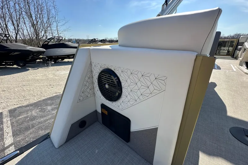 Slide: The Image of 2026 Alera M23Q boat interior with geometric speaker design and modern upholstery. - 9