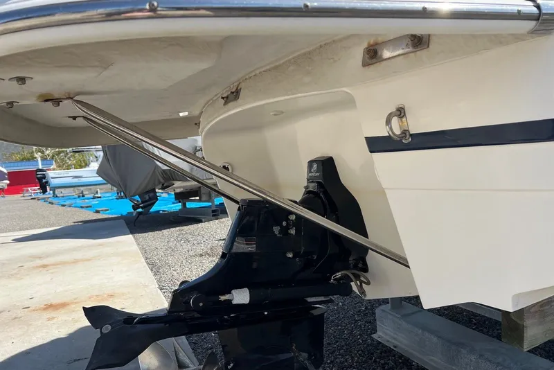 Slide: The Image of Rear view of a 2005 Regal 2400 Bowrider boat on a trailer. - 8