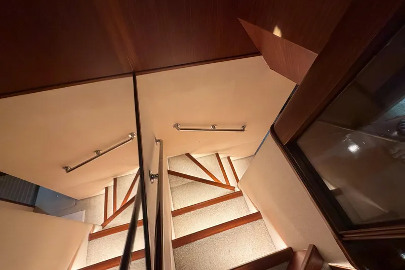 Slide: The Image of Bathroom interior of 1991 Hatteras 70 Motor Yacht with sink, mirror, and toilet. - 95