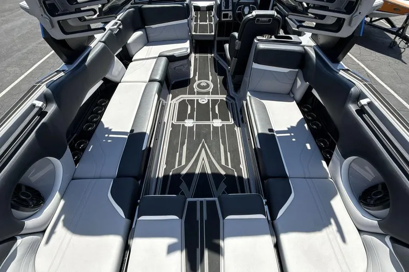 Slide: The Image of Luxurious interior of 2023 Supra SE 550 boat with sleek seating and modern design. - 10
