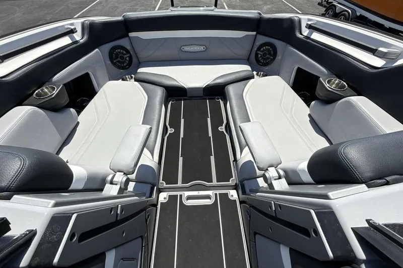 Slide: The Image of Interior of 2023 Supra SE 550 boat with luxurious seating and modern design. - 11